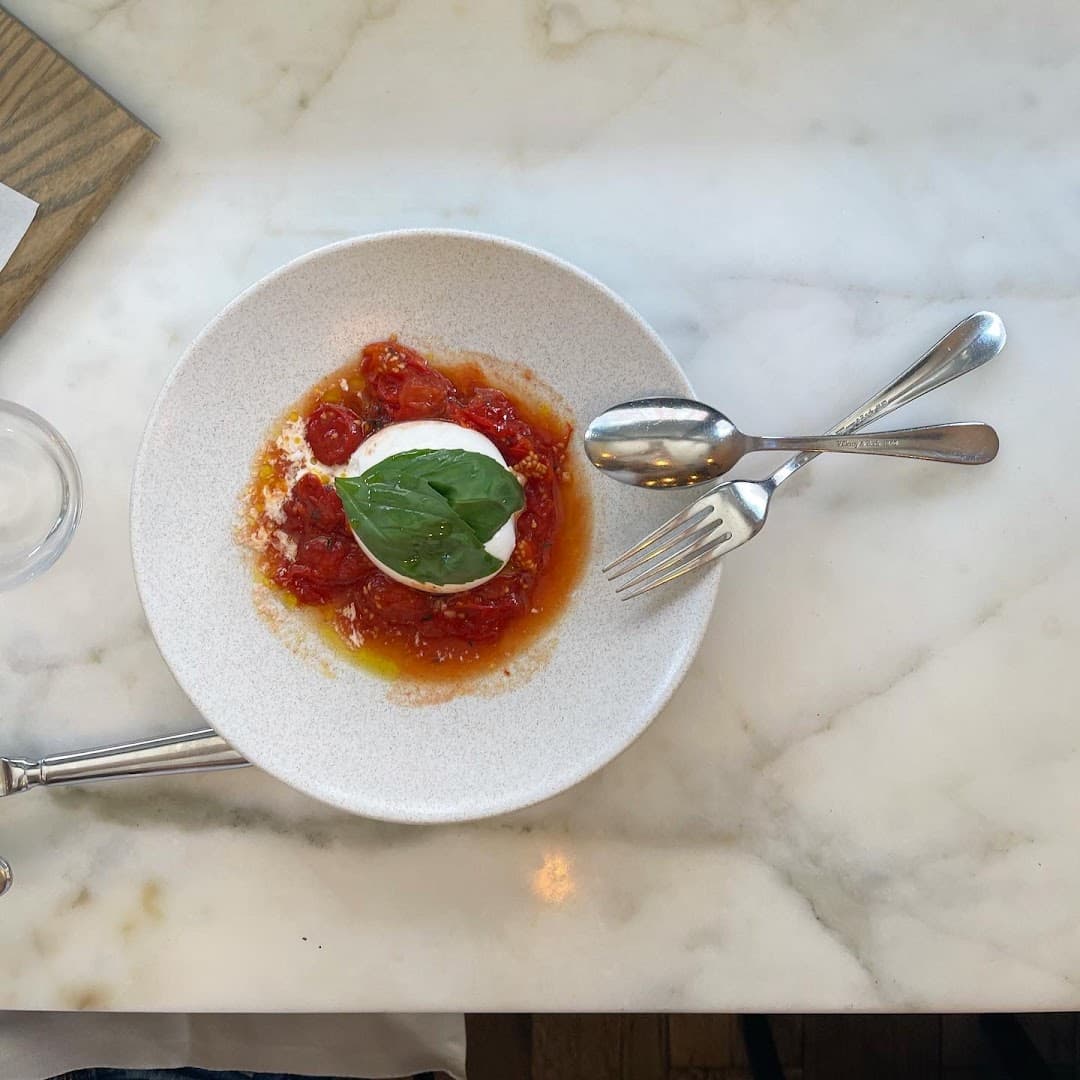 Burrata with tomatoes starter at Twist Connubio, London