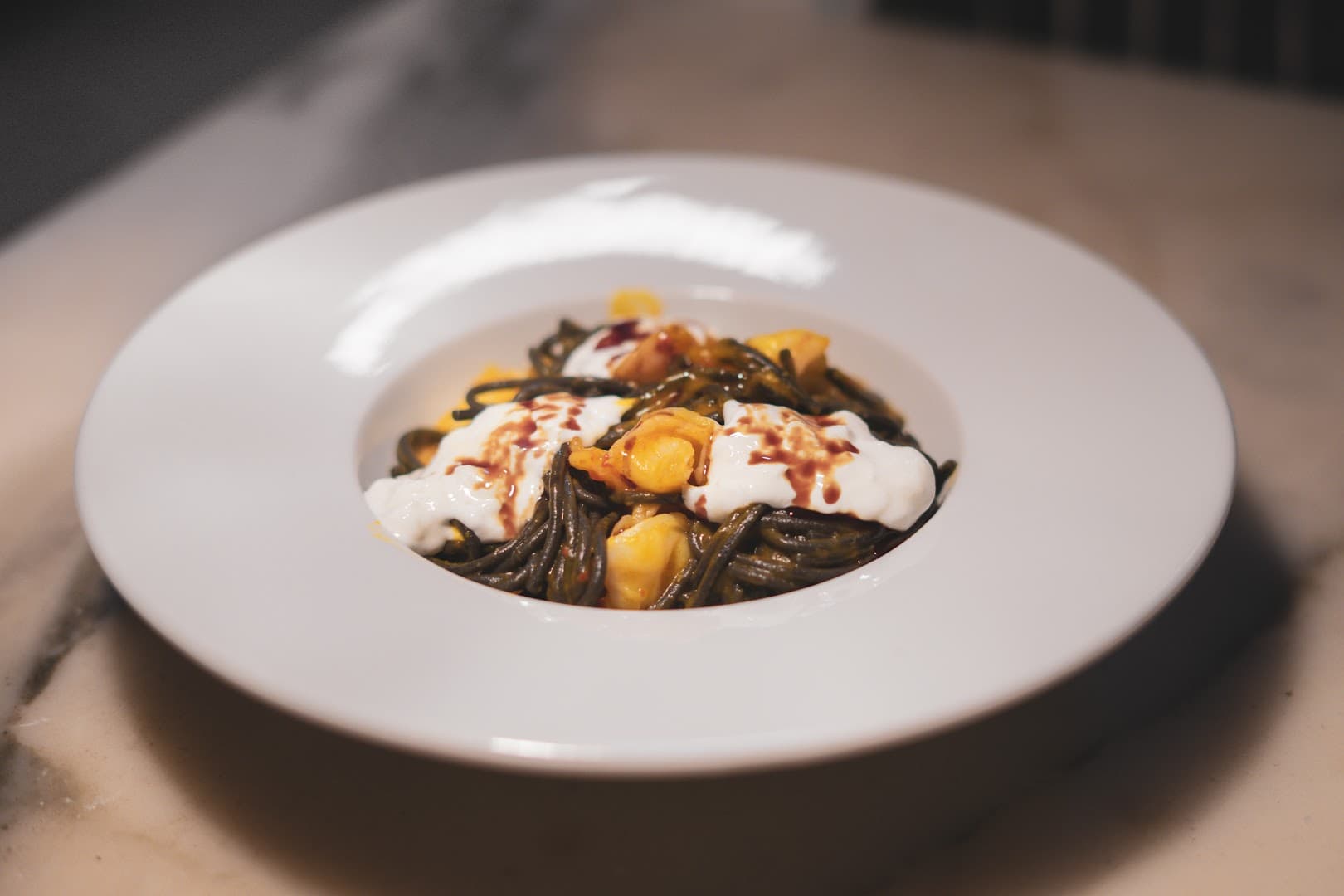 Squid ink pasta dish at Twist Connubio, London