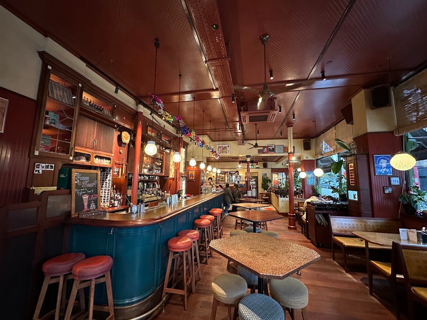Bar area and dining space at Dishoom Permit Room Portobello, London