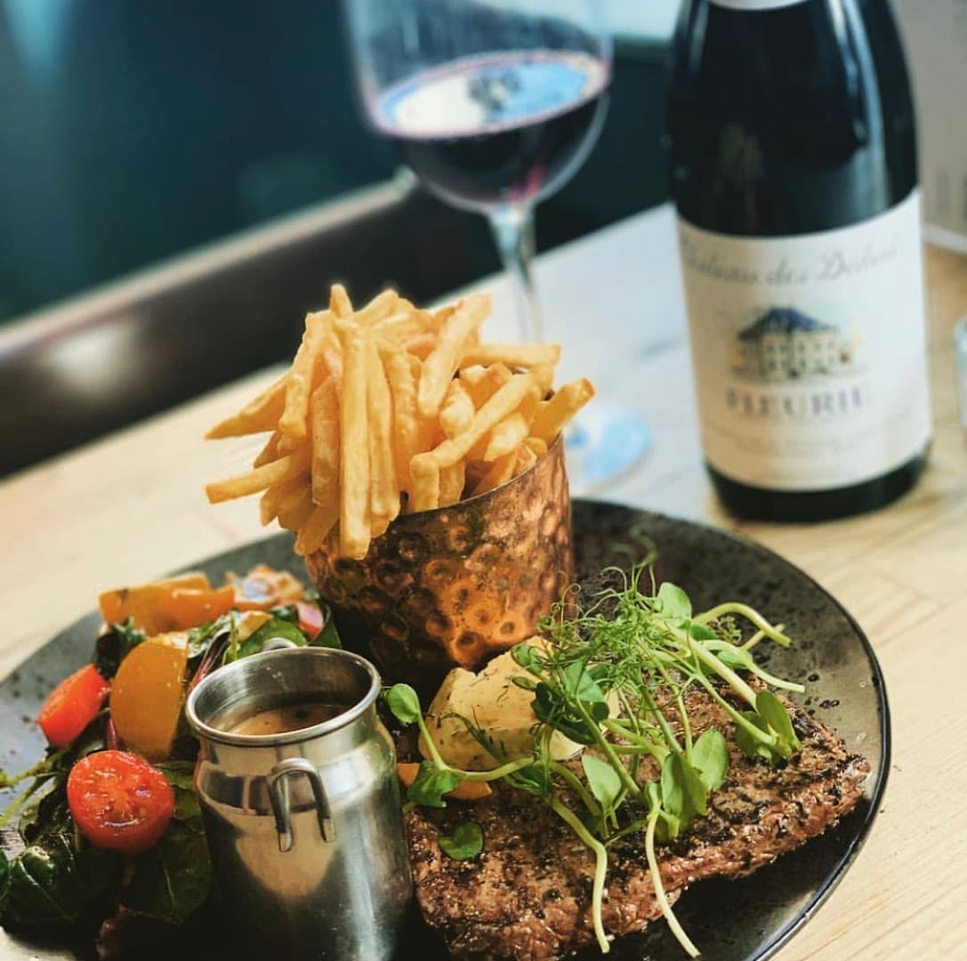 Pepper-crusted steak with frites at East Hill, London