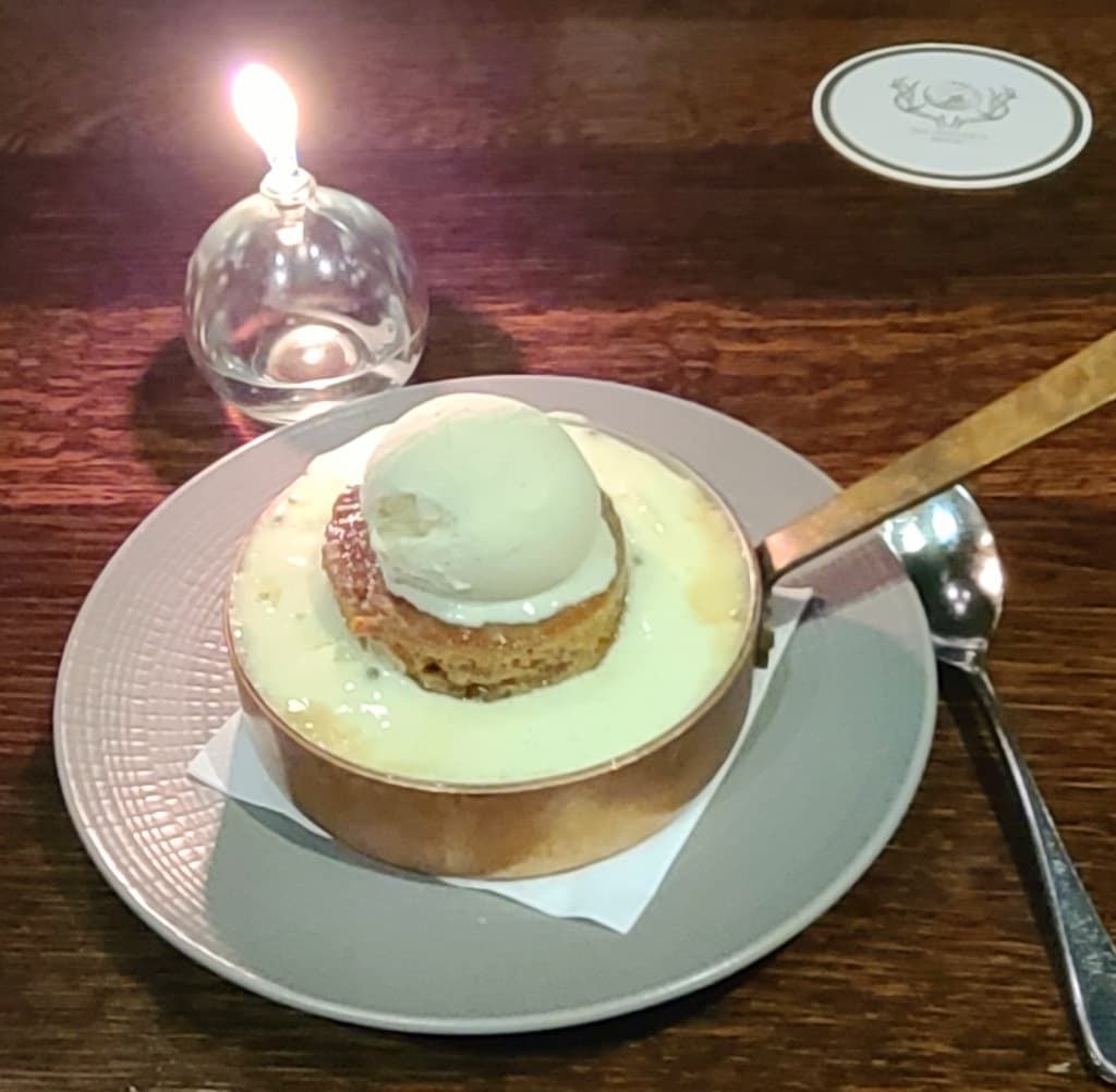 Pistachio soufflé dessert at The Hunter's Moon, London