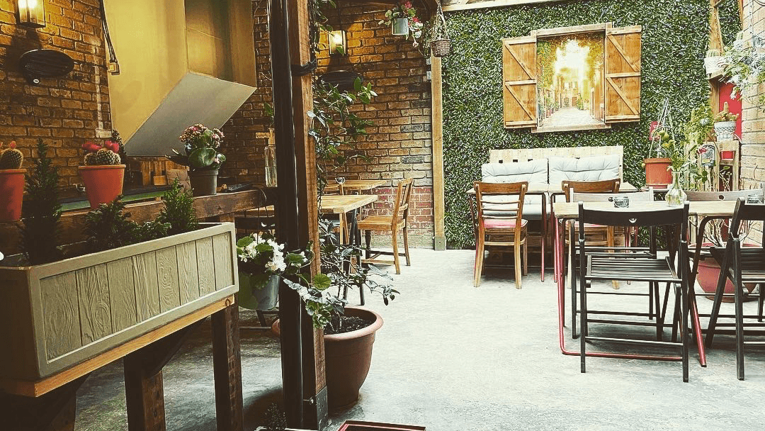 Outdoor courtyard seating at La Rosetta N16, London