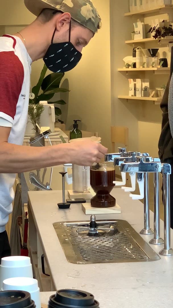 Barista coffee brewing at Nola Coffee, London