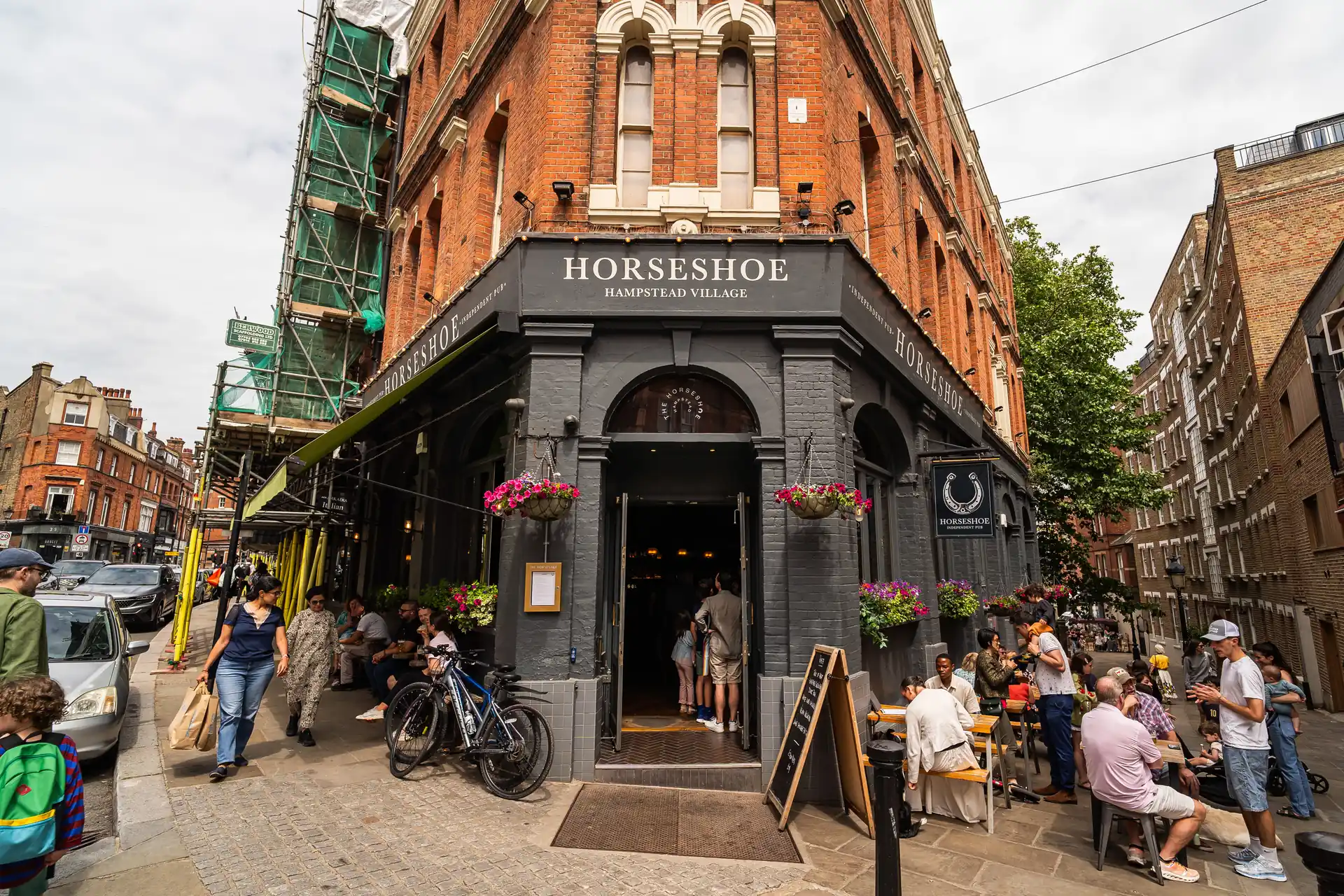 Front facade with outdoor seating at The Horseshoe, Hampstead Village, London