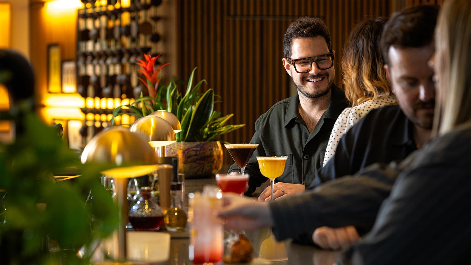 Bar seating with cocktails at Art Yard Bar & Kitchen, London