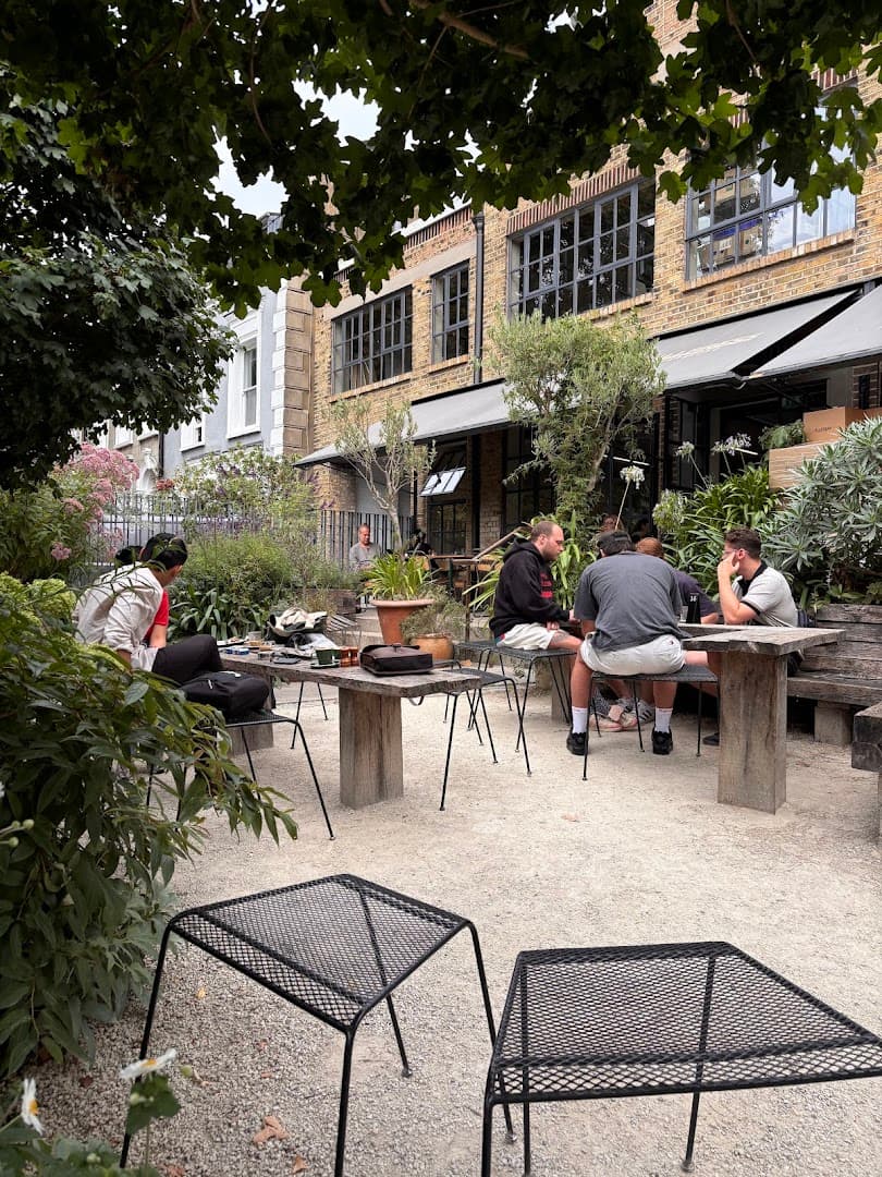 Outdoor courtyard garden at Allpress Espresso Roastery and Cafe, London