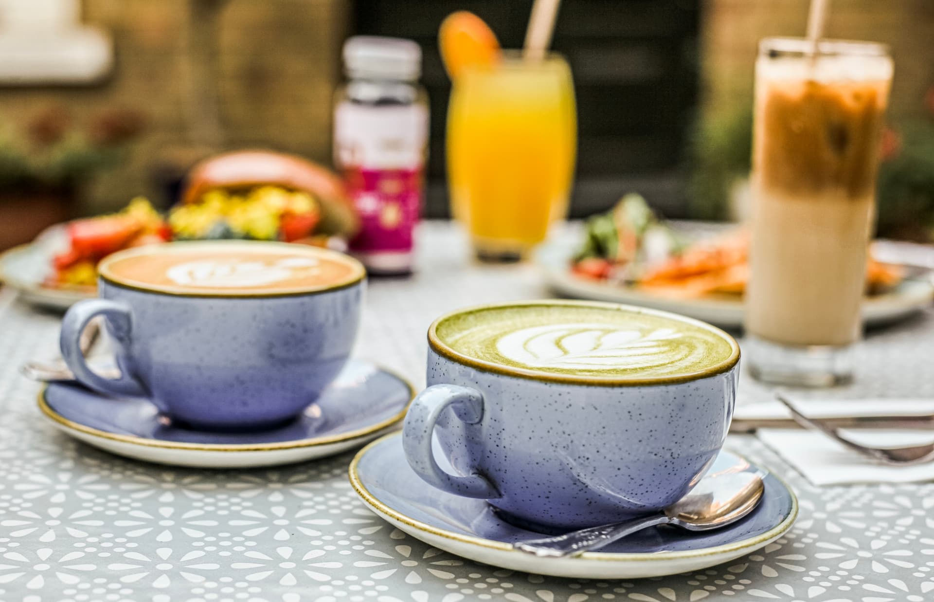 Brunch table with matcha lattes at Victoria House Coffee & Food, London