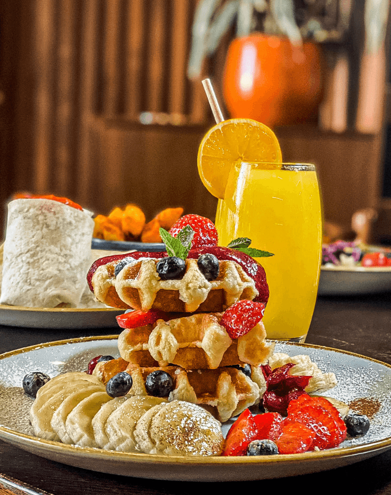 Waffle stack breakfast at Victoria House Coffee & Food, London