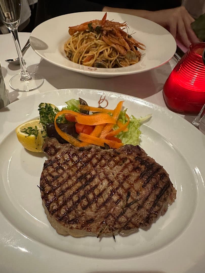 Grilled steak and prawn pasta at Bucci, London