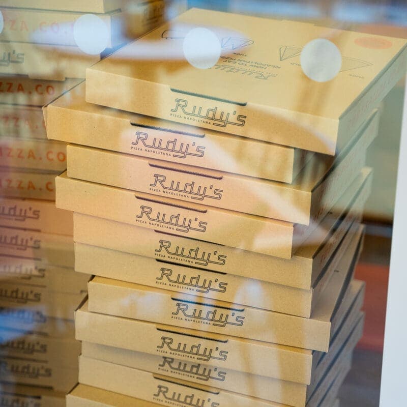 Stacked pizza boxes at Rudy's Pizza Napoletana, London