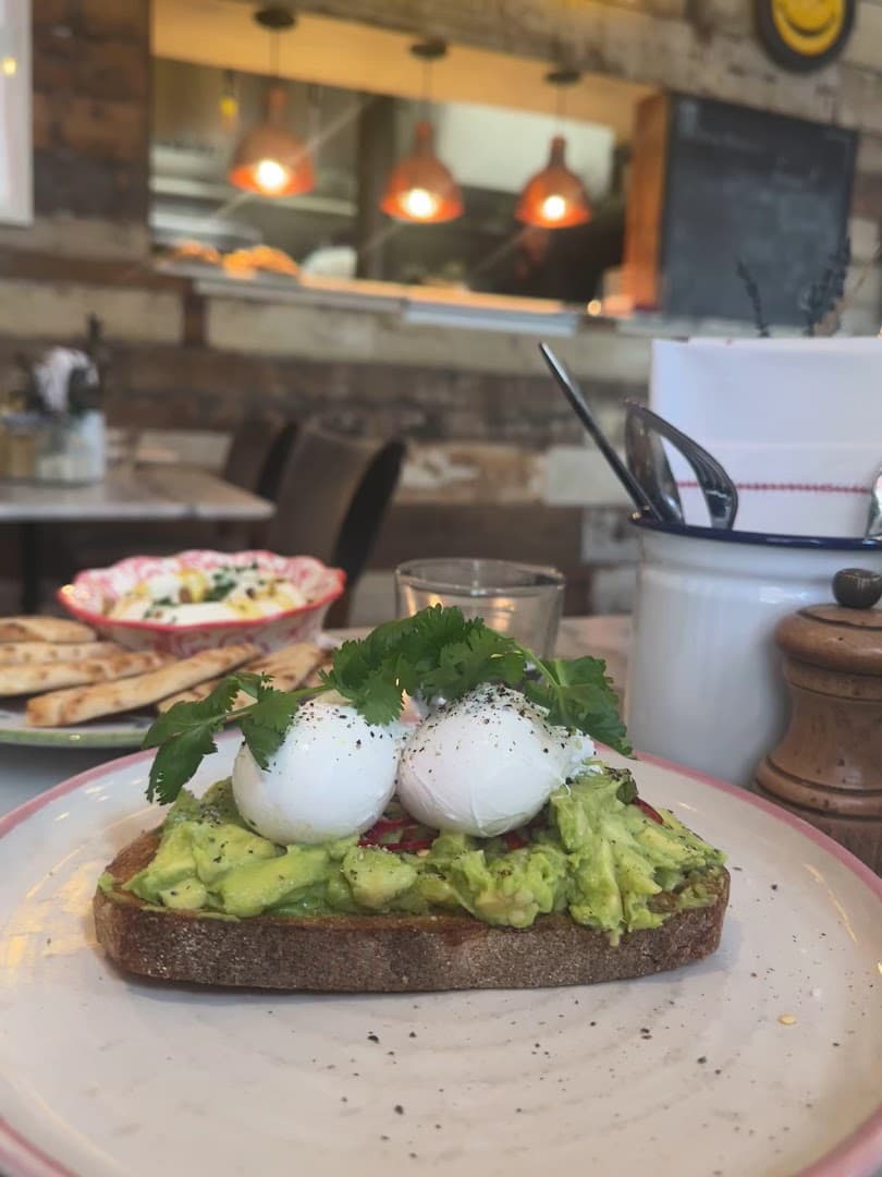 Avocado toast with poached eggs at Artist Residence Clubhouse, London