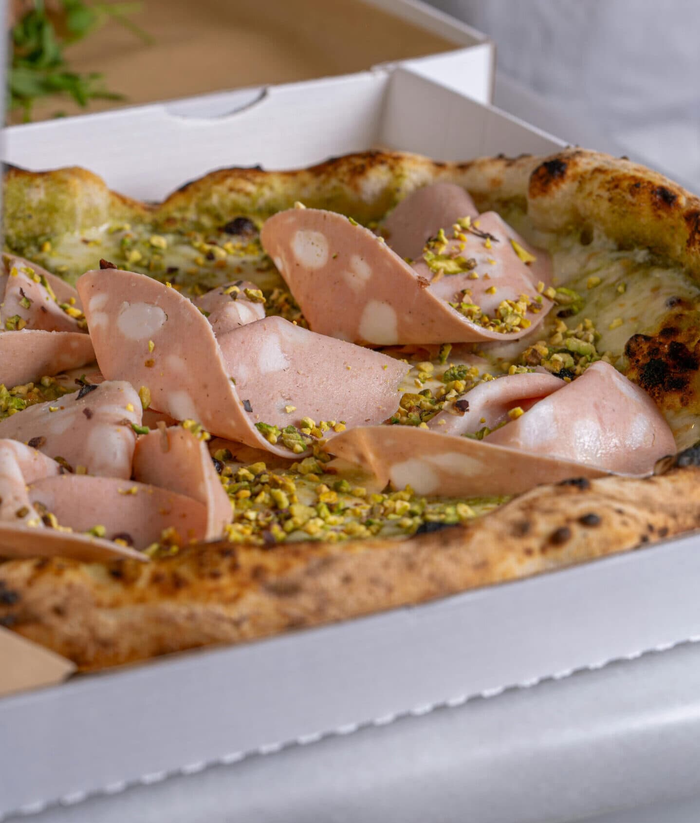 Sicilian mortadella pistachio pizza at Sicily Restaurant, London