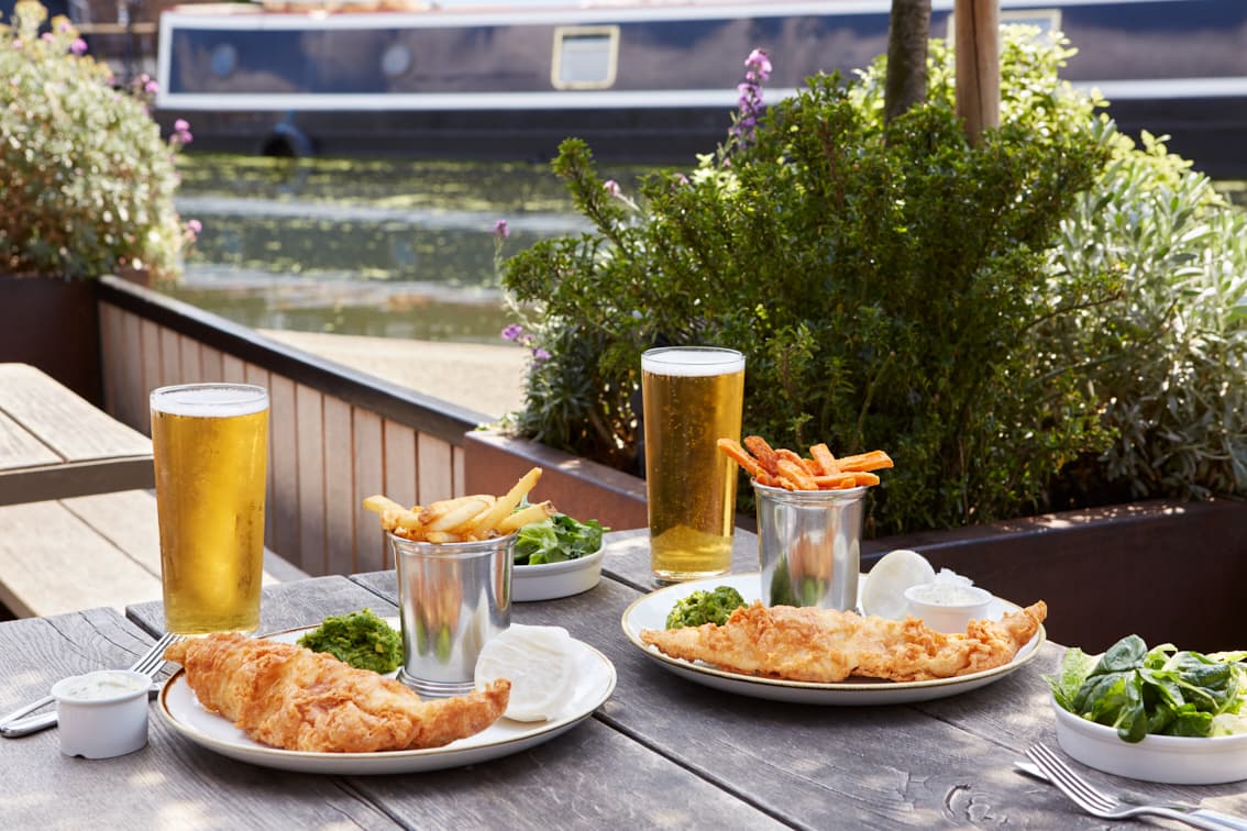 Fish and chips with beer at The Lighterman, London