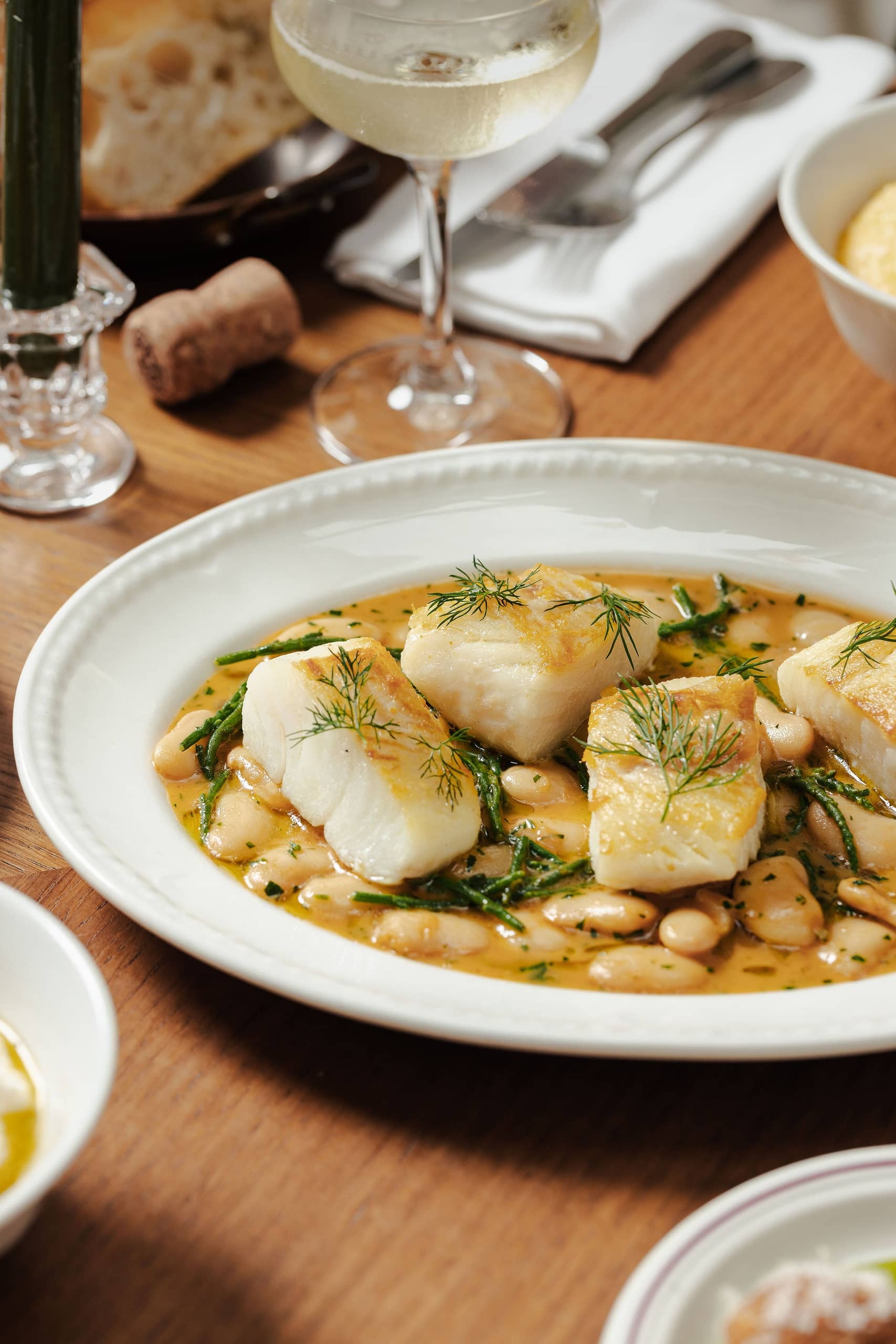 Seared scallops with white beans and samphire at Mortimer House Kitchen, London