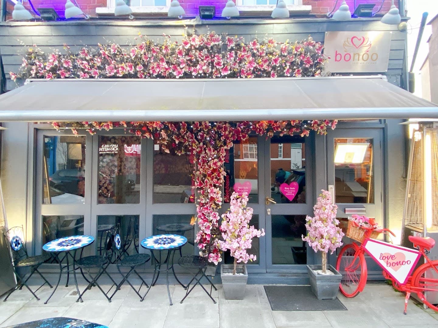 Front entrance with outdoor seating at Bonoo Indian Tapas Hampstead, London