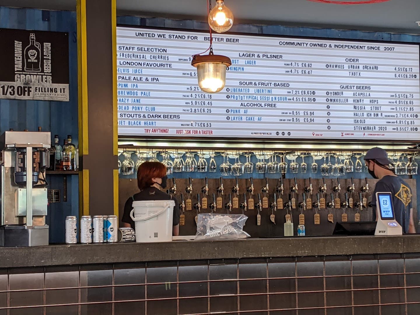Bar area with beer taps at BrewDog Canary Wharf, London