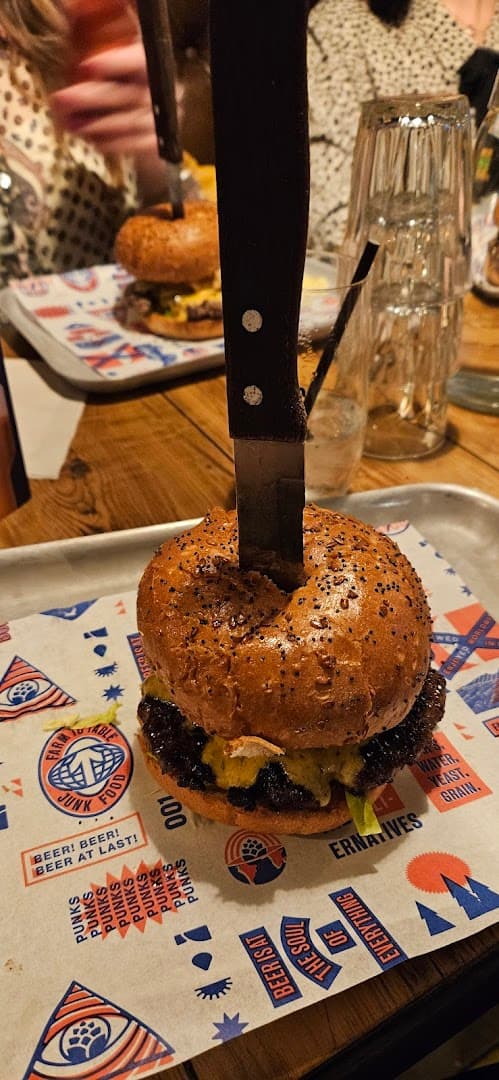 Gourmet burger with knife at BrewDog Canary Wharf, London
