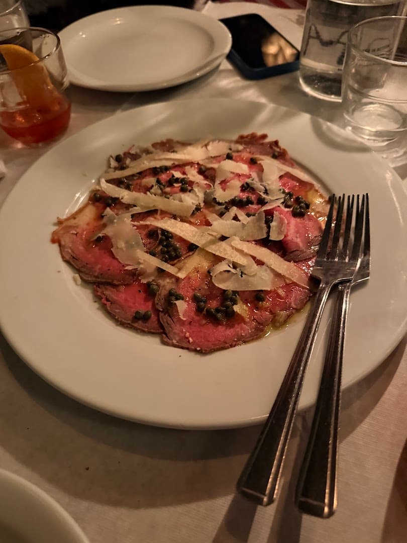 Sliced beef carpaccio with parmesan at Brutto, London