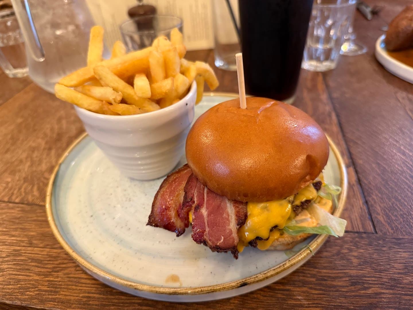 Bacon cheeseburger with fries at Bull Highgate, London