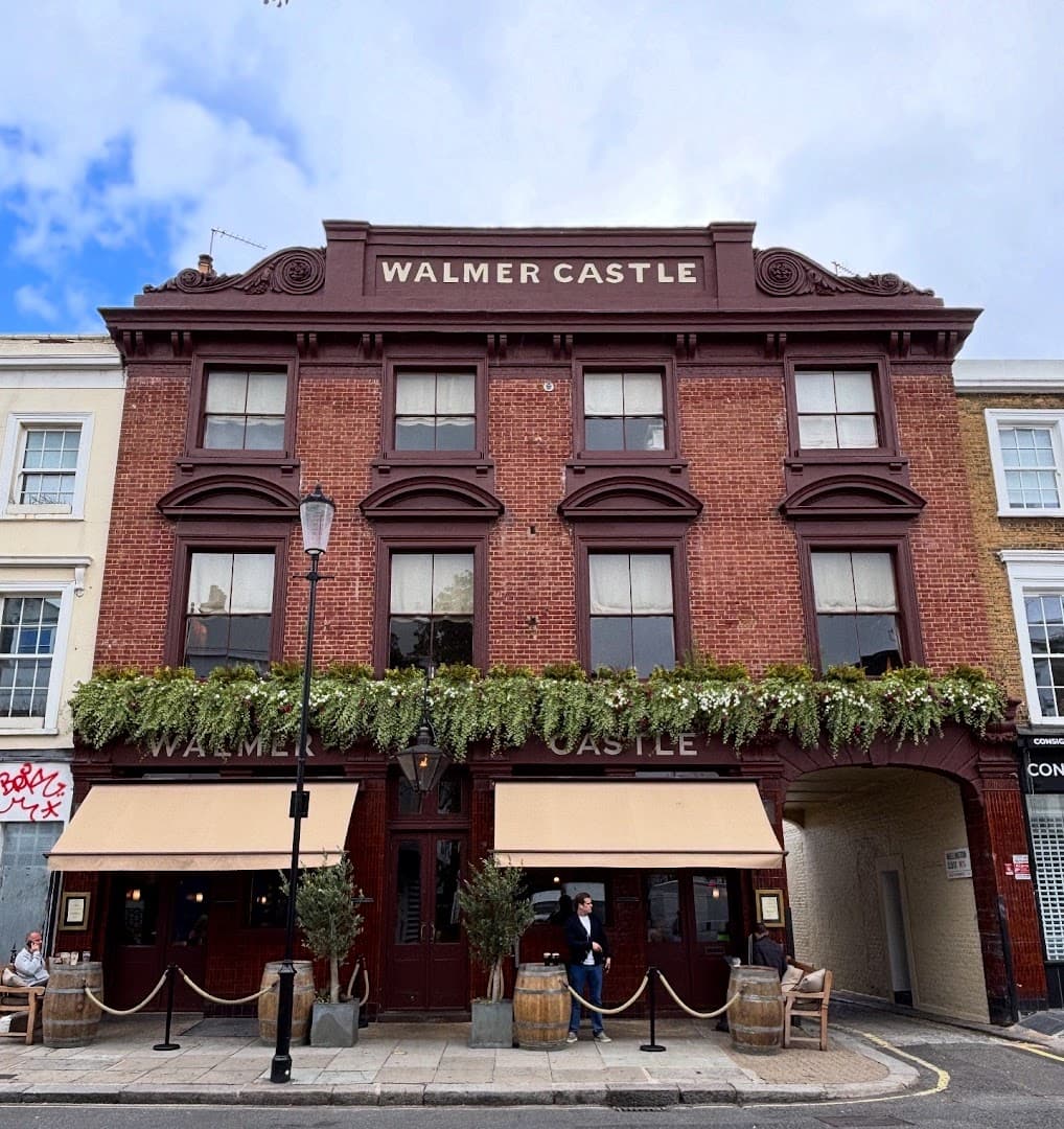 Front facade with outdoor seating at The Walmer Castle, London