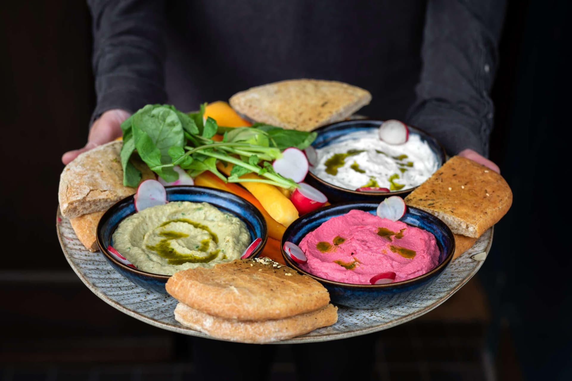 Mezze platter with hummus varieties at Duke of Clarence, London