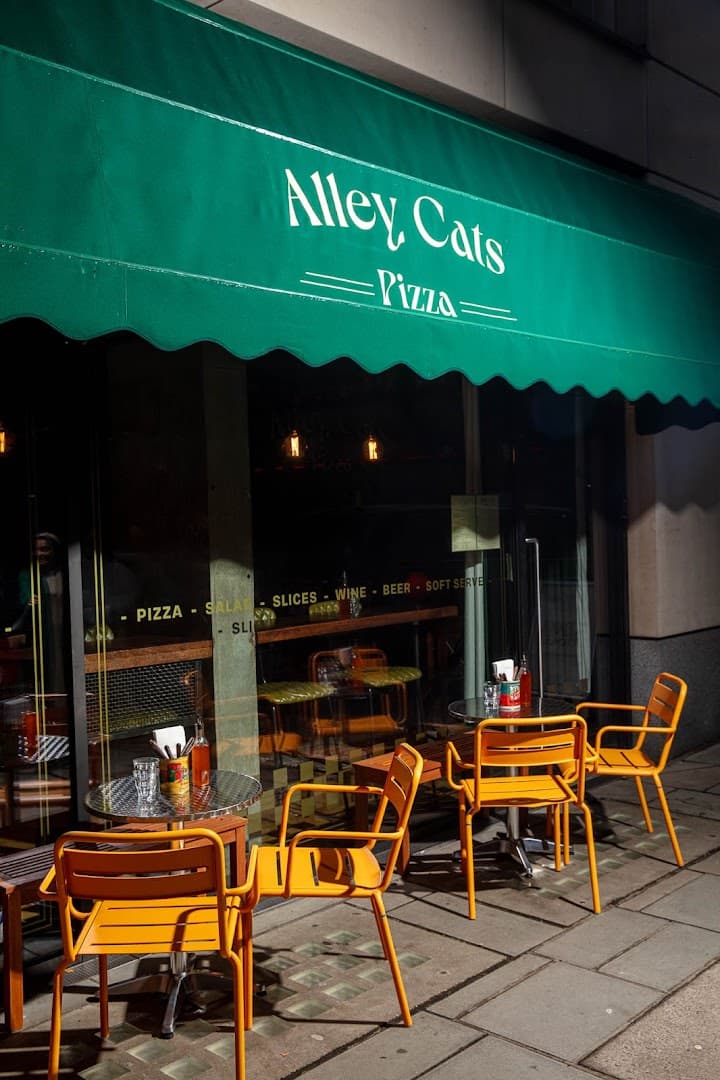 Outdoor dining area at Alley Cats Pizza, London