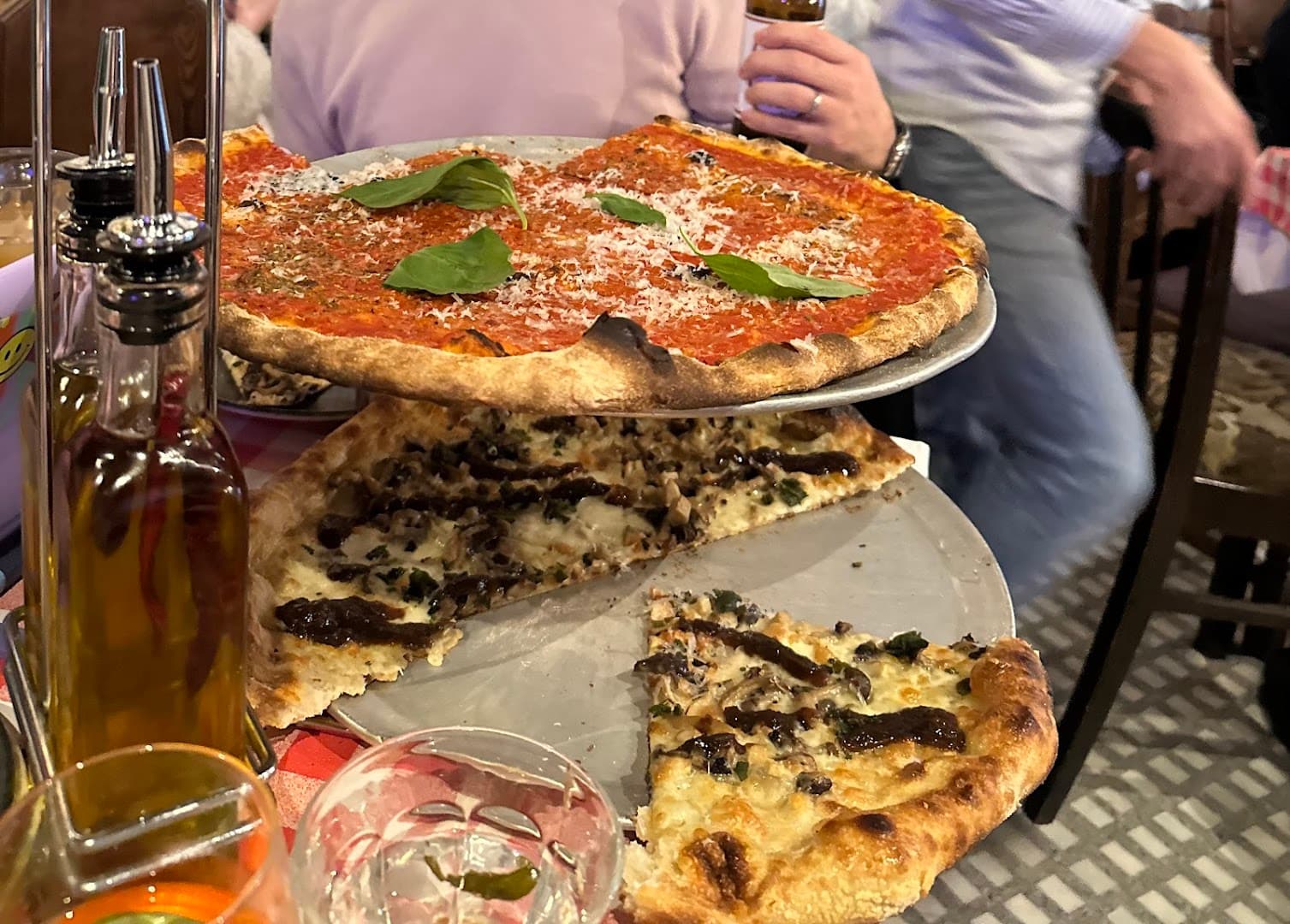 Stacked pizzas display at Alley Cats Pizza, London