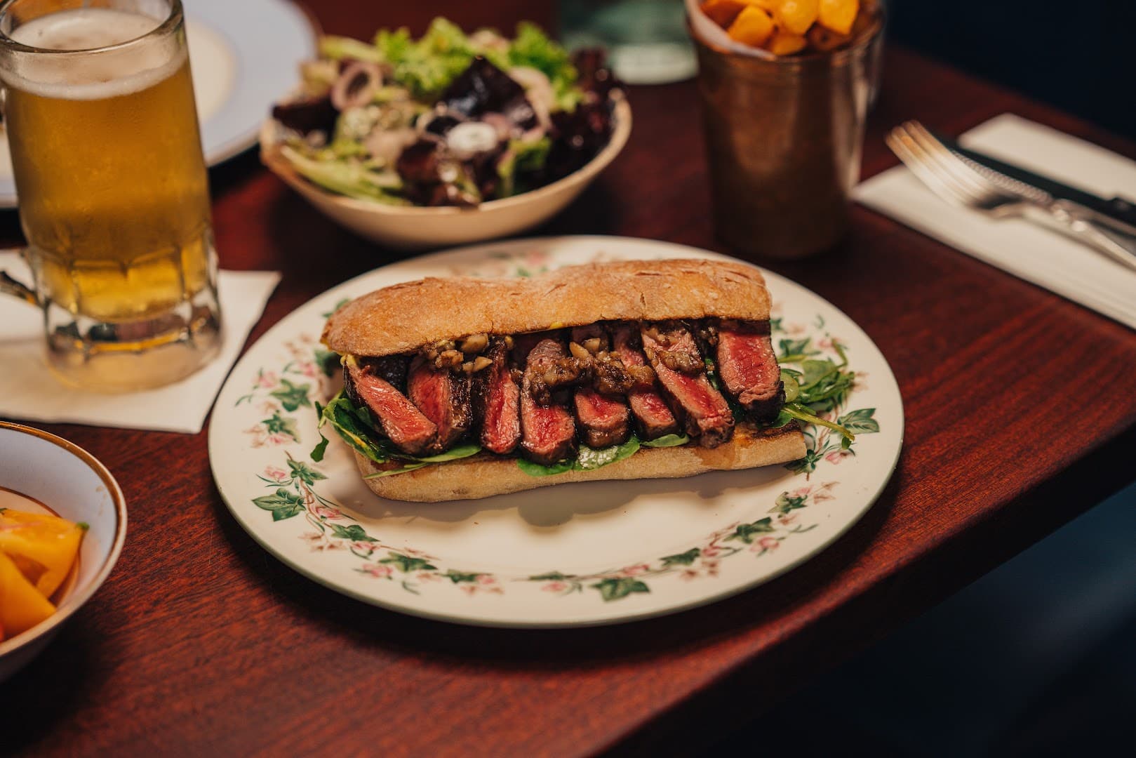 Steak sandwich with beer at Blacklock Canary Wharf, London