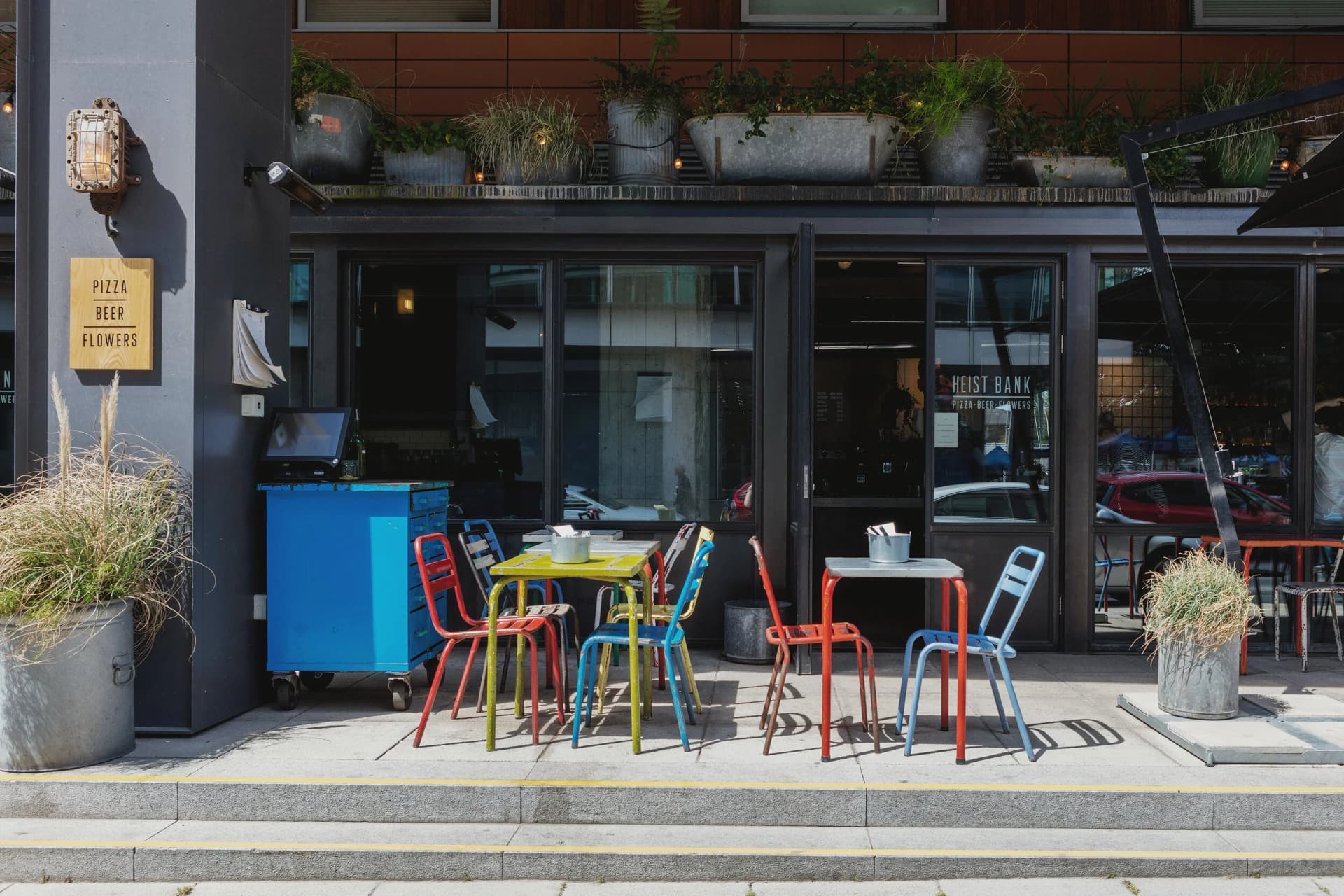 Outdoor seating area at Heist Bank, London