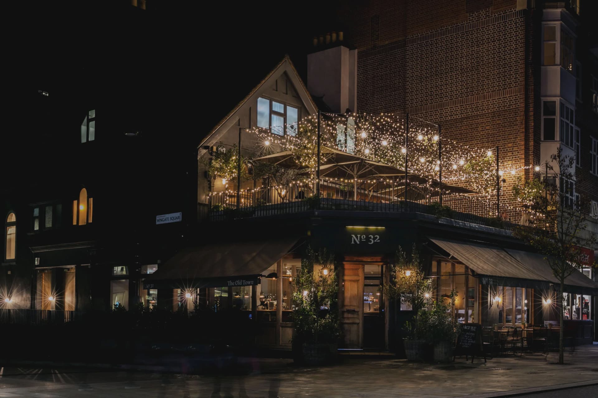 Front facade at night at No 32 The Old Town, London
