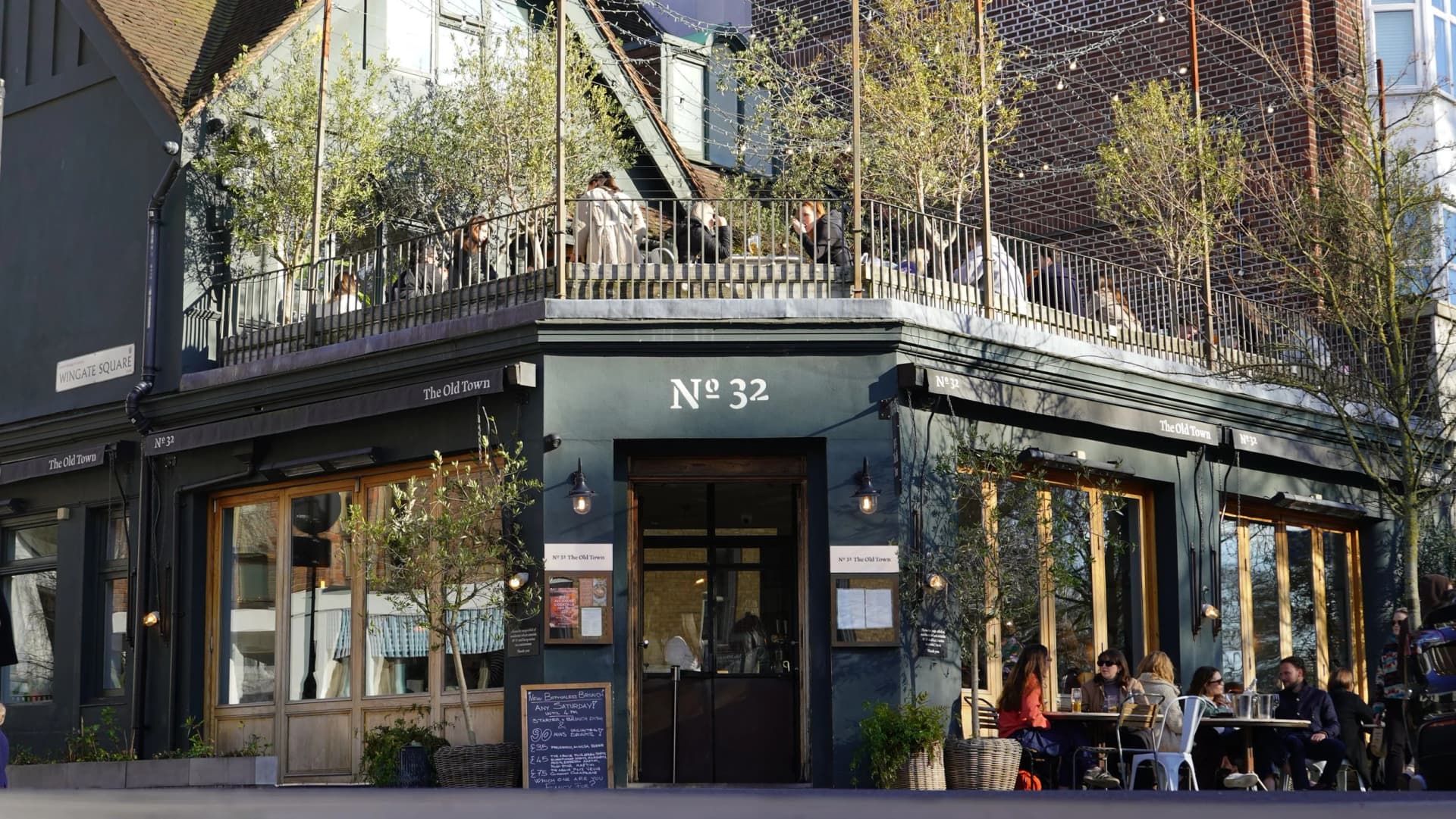 Front facade with outdoor seating at No 32 The Old Town, London