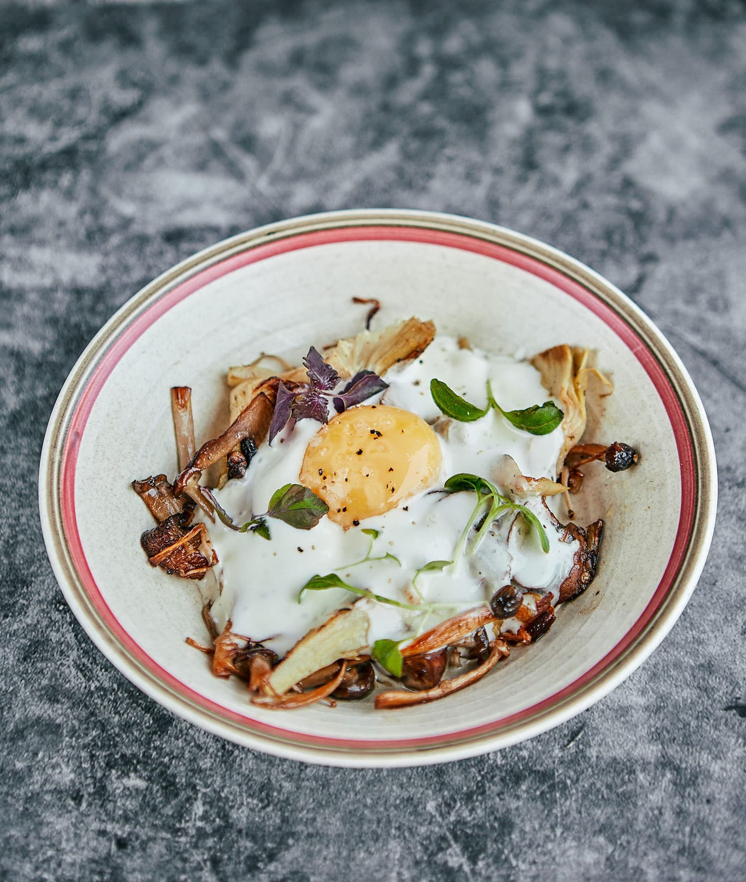 Fried egg with mushrooms dish at El Ganso Cafe, London