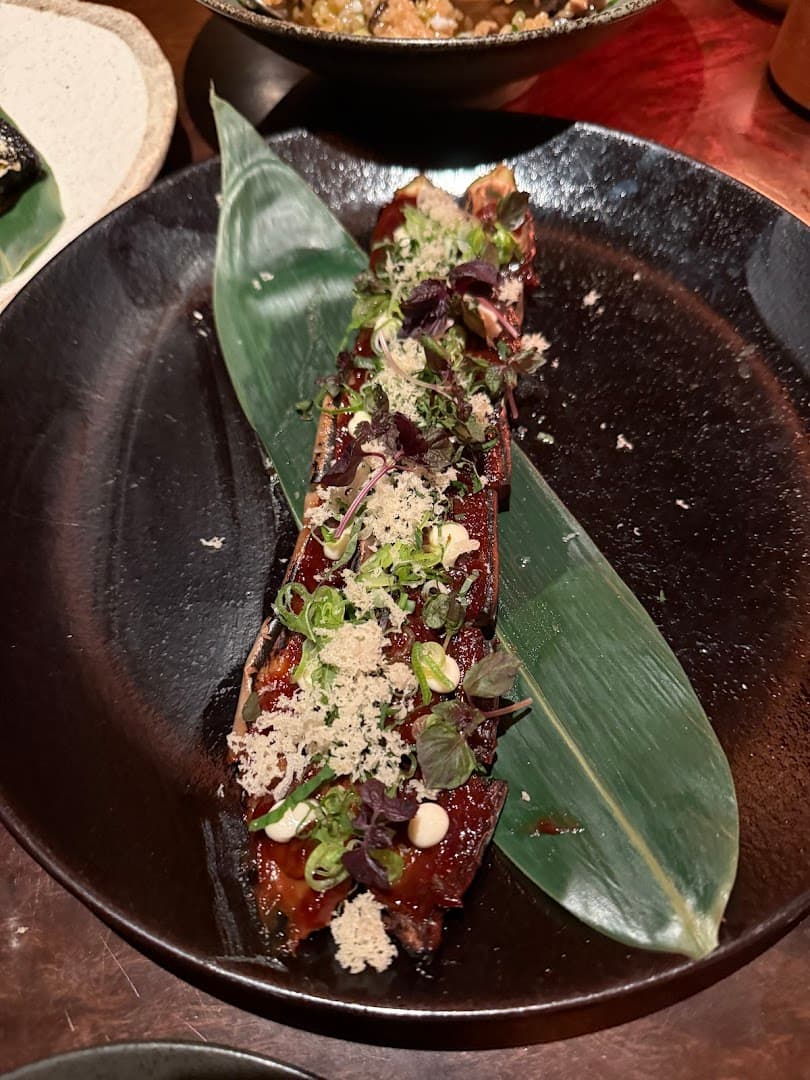 Glazed skewered protein dish at The Aubrey, London