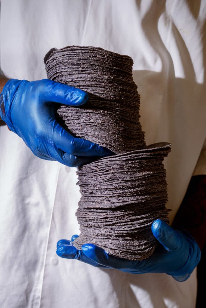 Blue corn tortillas stack at El Pastor King's Cross, London