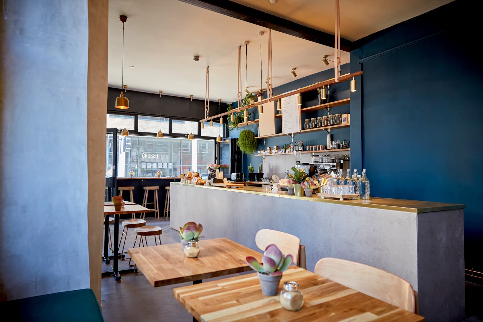 Modern café counter and seating area at Wildcard, London