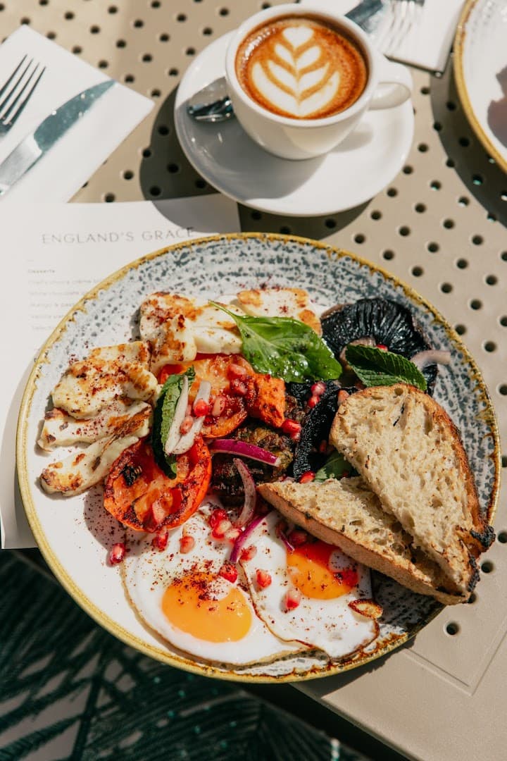 Brunch plate with coffee at England's Grace, London