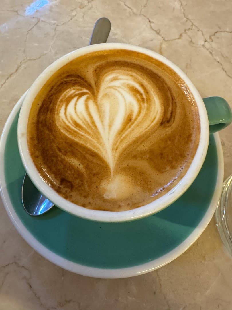 Latte art coffee at England's Grace, London