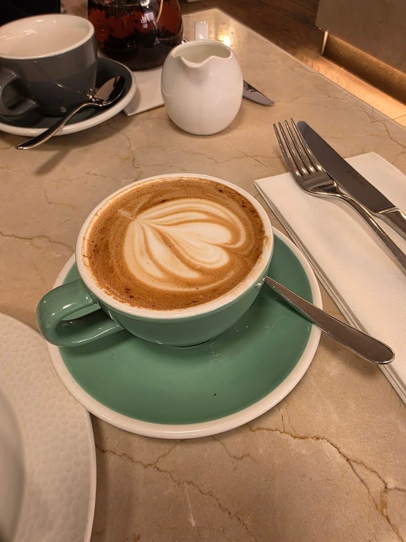 Latte table setting at England's Grace, London