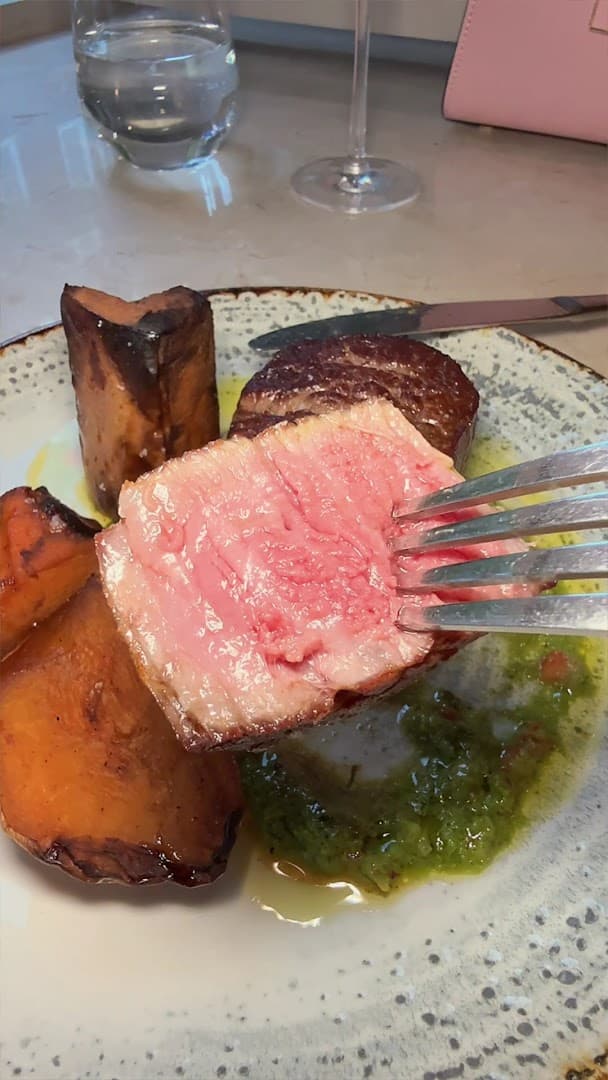 Medium-rare beef roast bone at England's Grace, London
