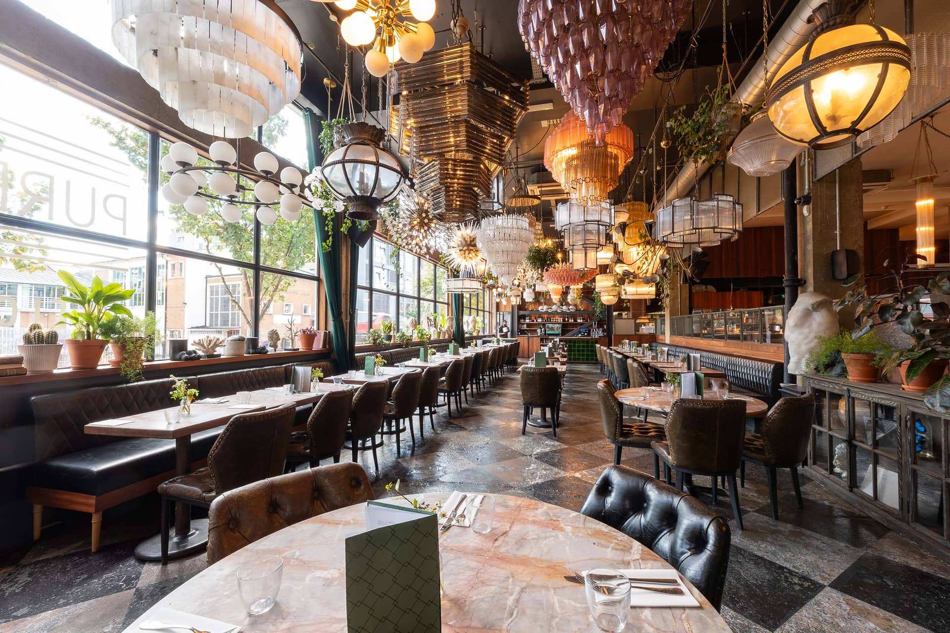 Main dining room with statement chandeliers at Mare Street Market Hackney, London
