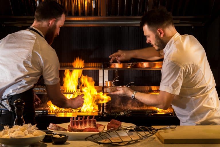 Open kitchen flambé service at No. Fifty Cheyne, London