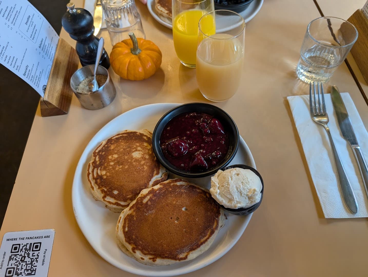 Pancakes with cherry compote and cream at Where The Pancakes Are, Flat Iron Square, London
