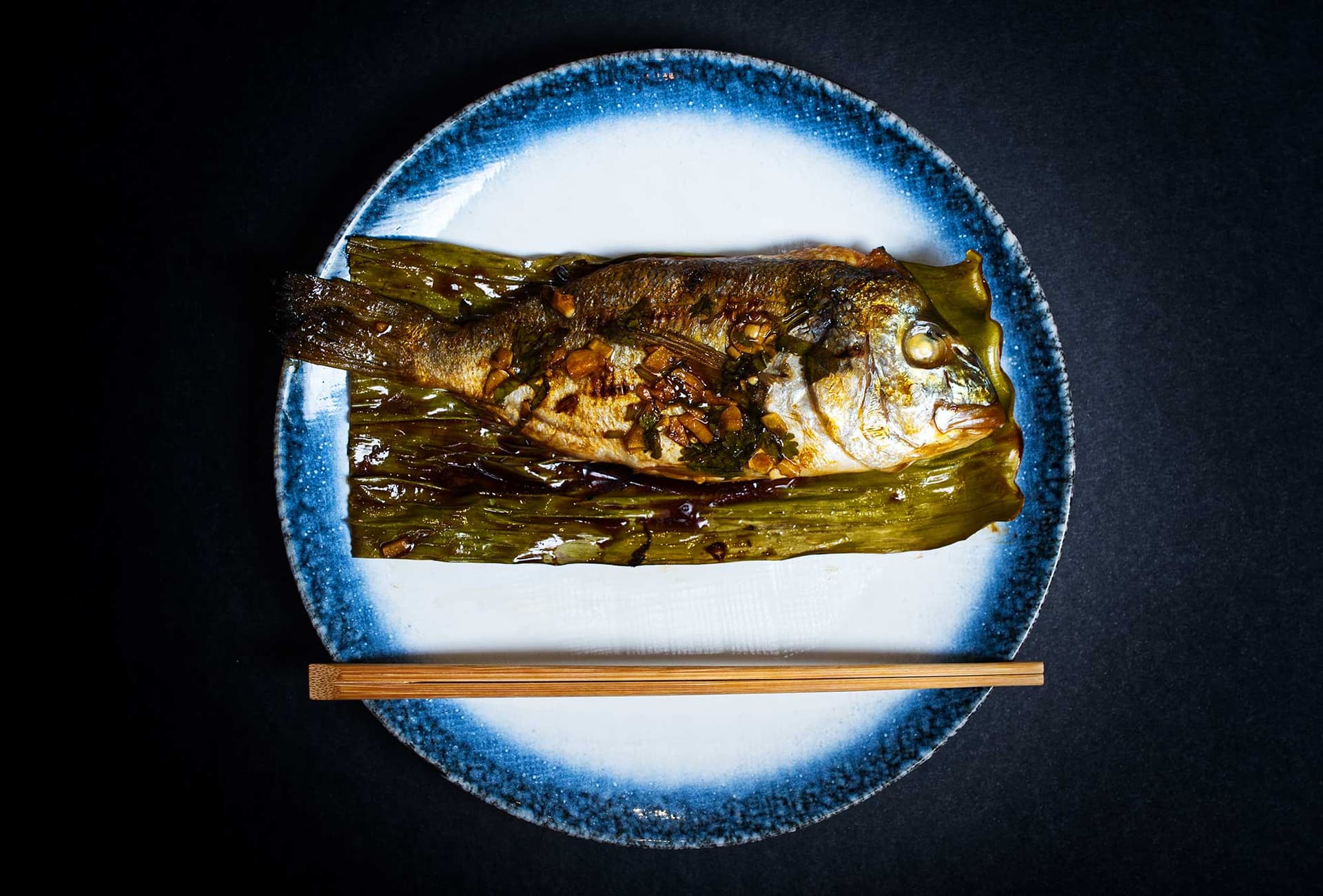 Grilled fish wrapped in banana leaf at Foley's, London