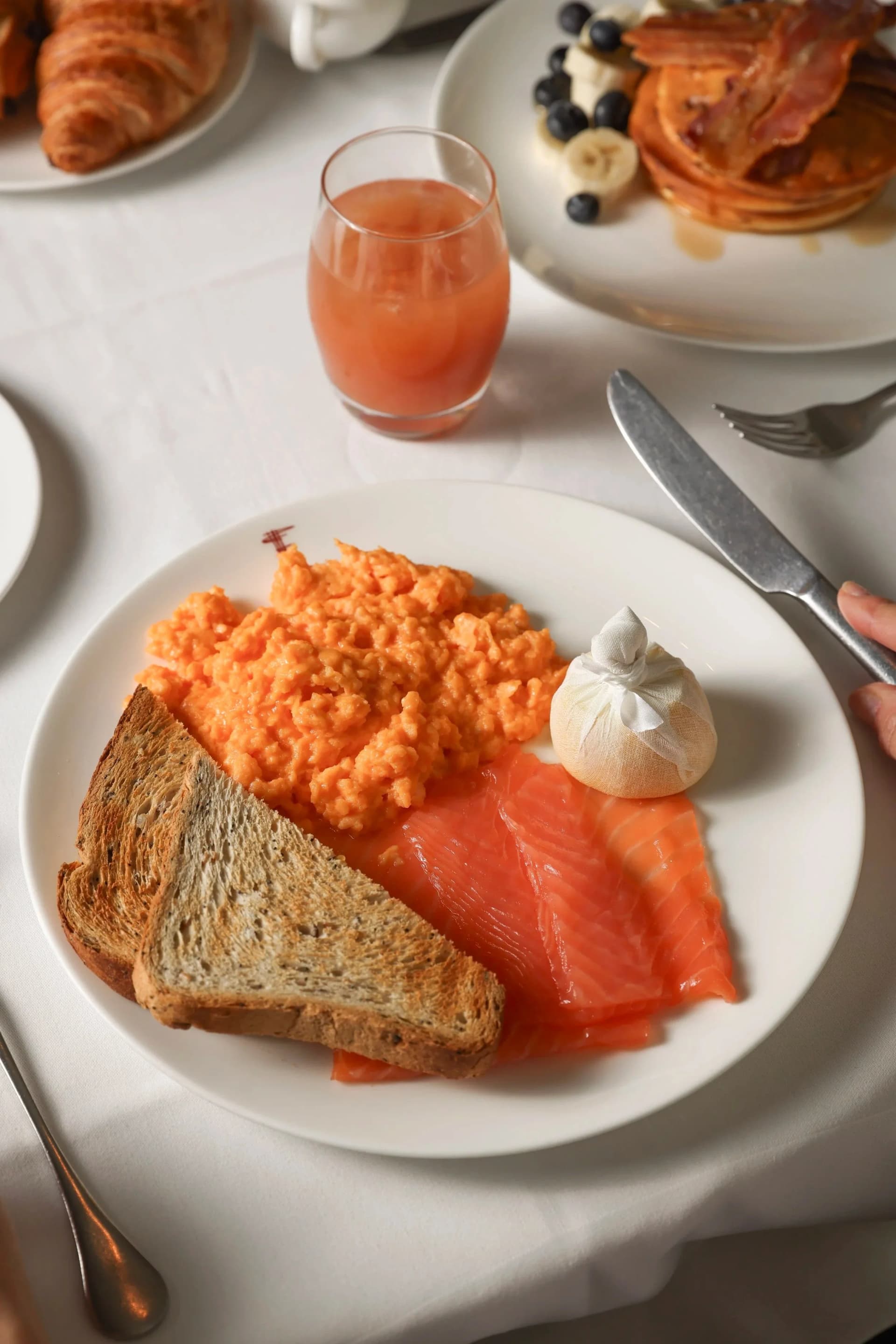 Smoked salmon scrambled eggs breakfast at Franco's, London