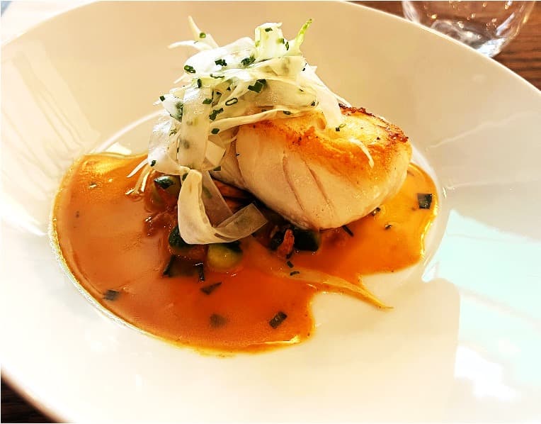 Seared scallop dish at Home Kitchen Primrose Hill, London