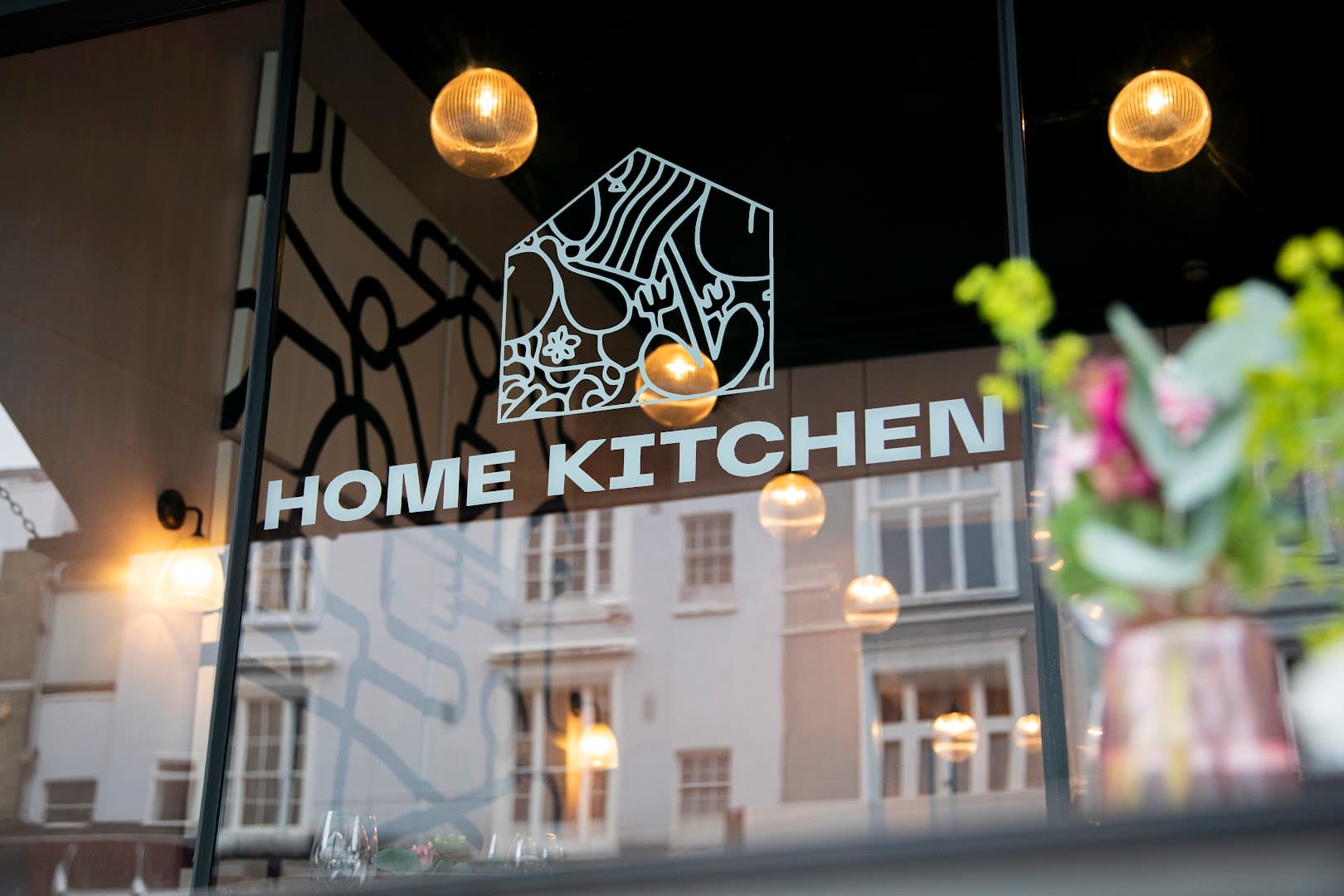 Window signage at Home Kitchen Primrose Hill, London