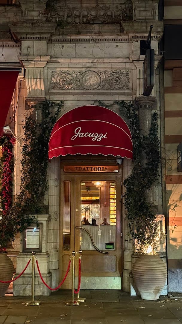 Front entrance at night at Jacuzzi Trattoria, London