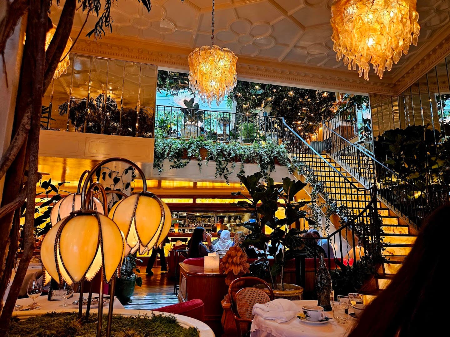 Ornate dining room with chandelier at Jacuzzi, London