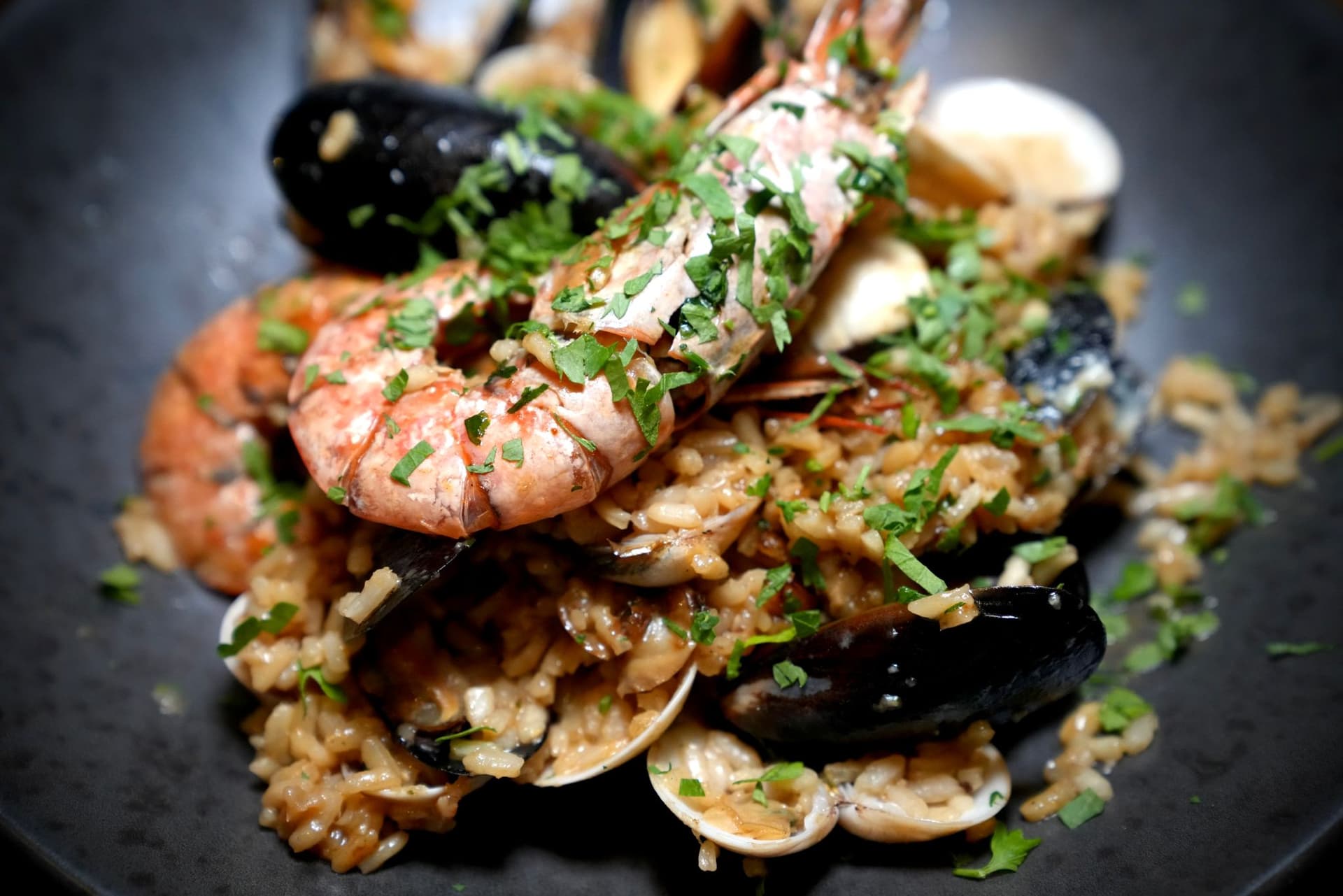 Seafood paella dish at La Cucina Di Daffy 2 Italian Restaurant, London