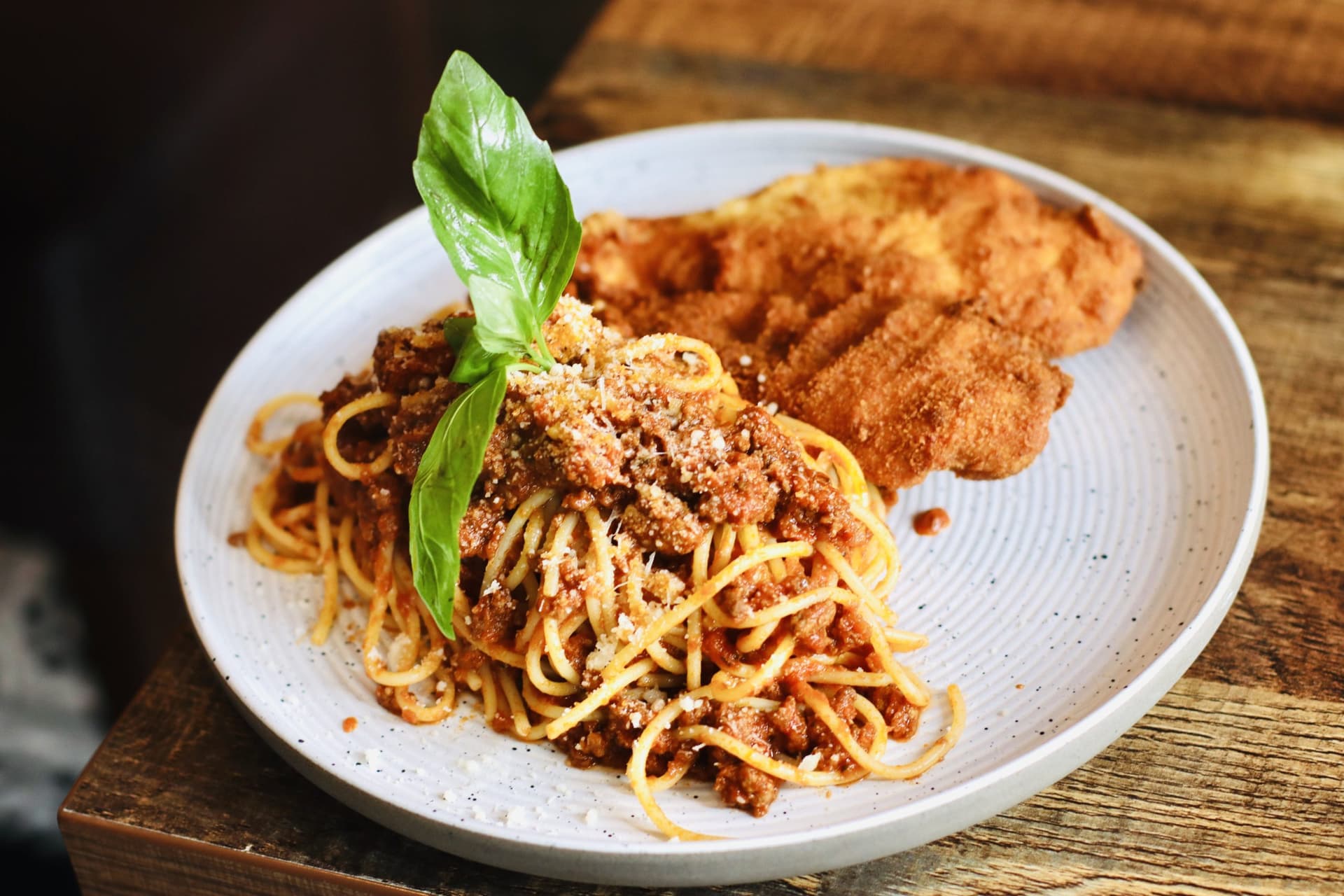 Spaghetti bolognese with garlic bread at La Cucina Di Daffy 2 Italian Restaurant, London
